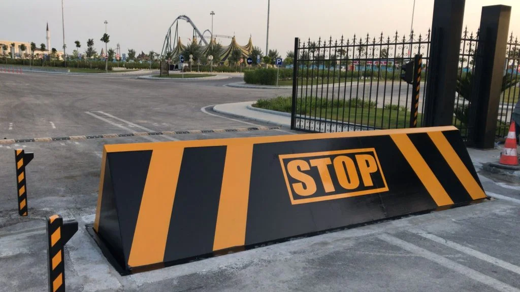 Automatic road blocker with STOP sign for secure vehicle access at controlled entrances in Pakistan