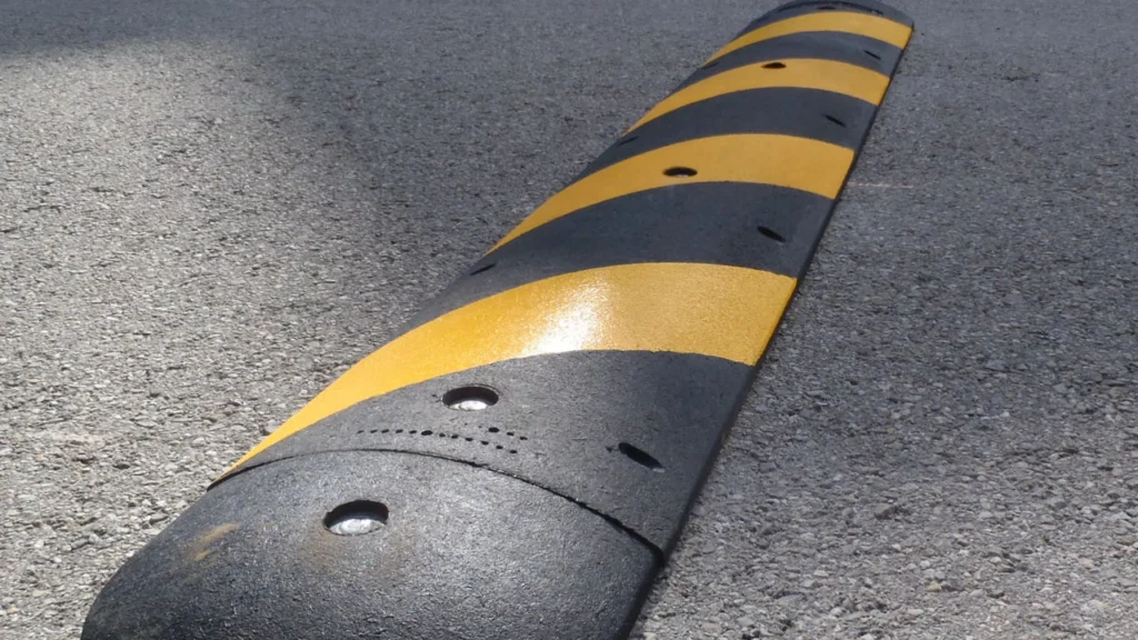 Heavy duty rubber speed breaker for road safety and vehicle speed control
