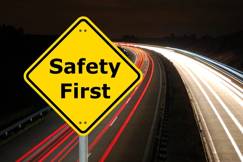 Safety first road sign for traffic awareness and road safety management